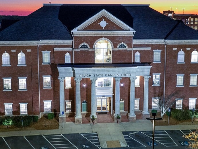 the front of a Peach State Bank & Trust building