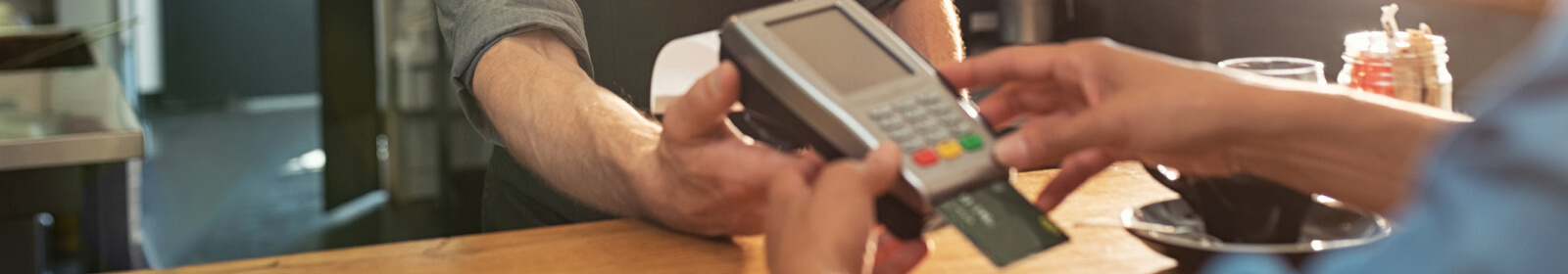 person using a card reader